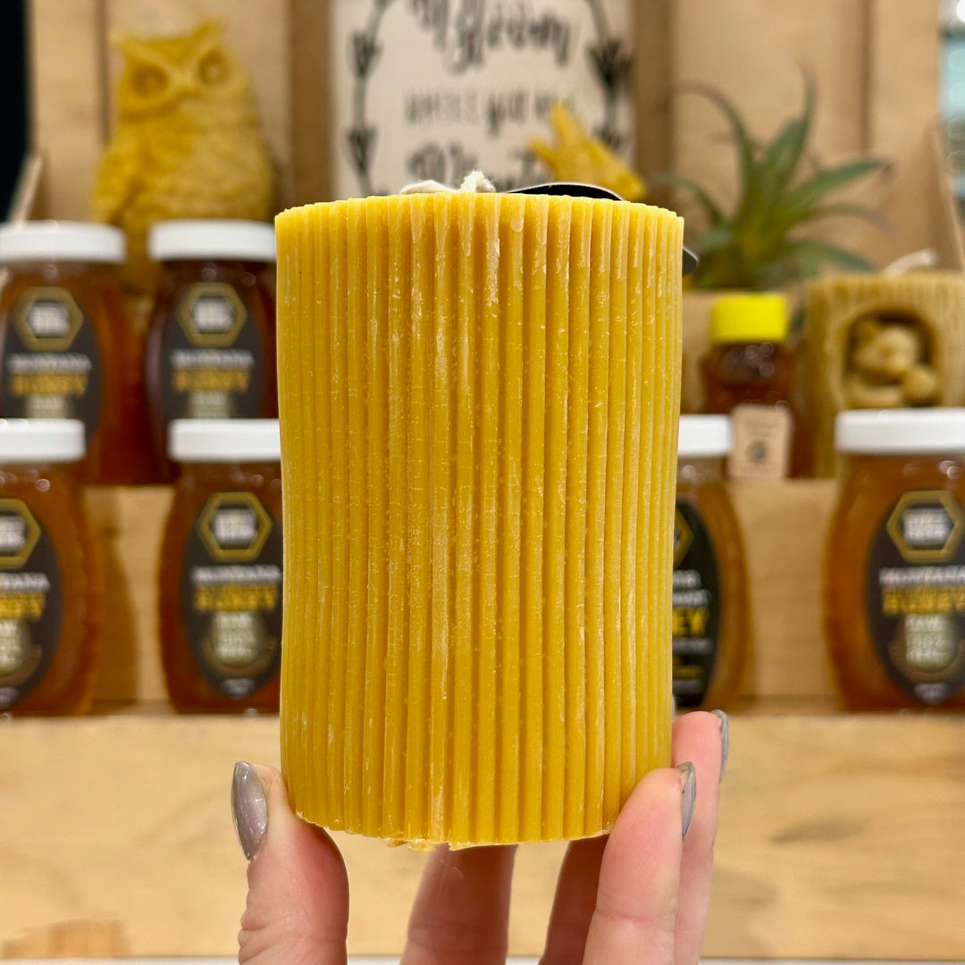 A textured pillar candle made of 100% Montana Beeswax