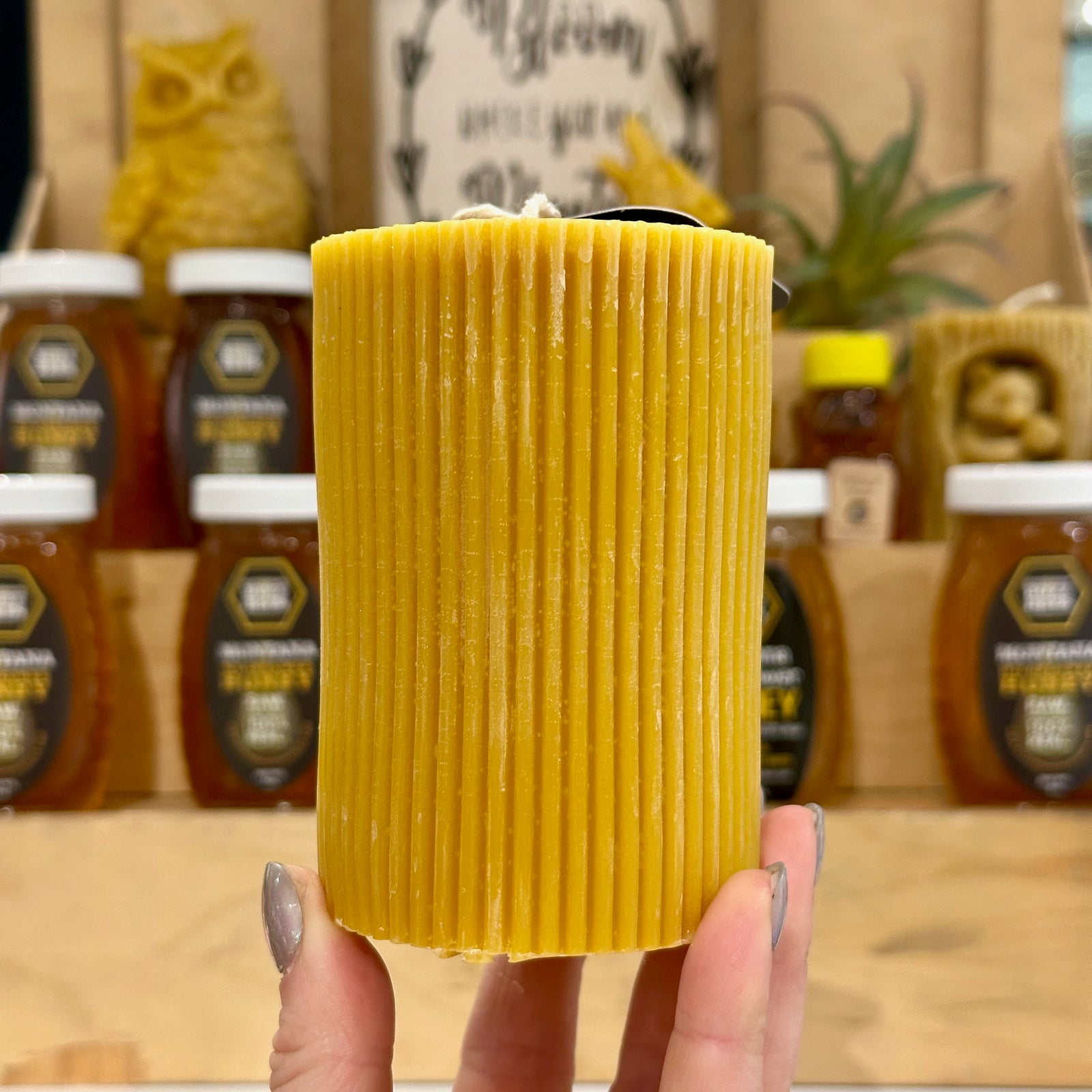 A textured pillar candle made of 100% Montana Beeswax