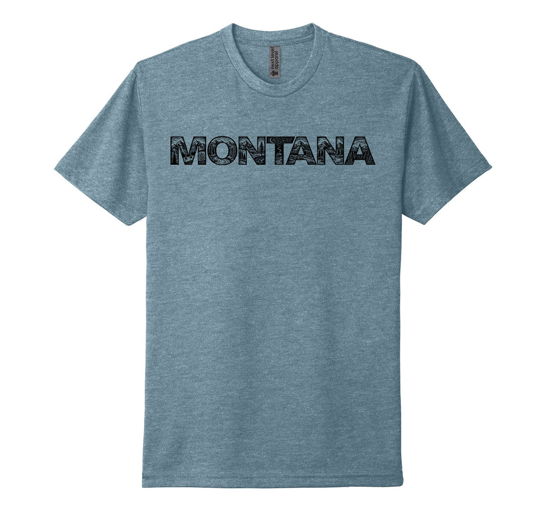 Heather slate blue Next Level Apparel unisex adult tee featuring the outline of the official MT Department of Commerce ‘Montana’ lettering filed in with graphics of trees, mountains, and trails, designed and printed in Montana by Blue Peak Creative