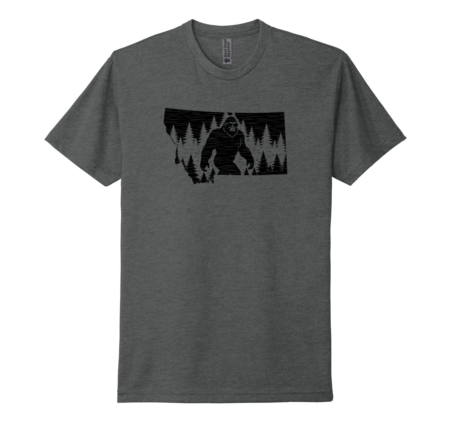 Heather dark grey Next Level Apparel unisex tee featuring a black illustration of Bigfoot mid-stride amidst trees, wearing sunglasses, and boldly looking at the viewer from within the outline of the state of Montana, designed and printed in Montana by Blue Peak Creative