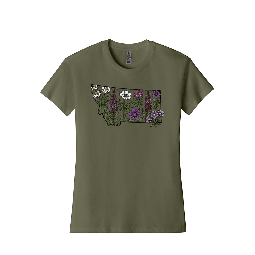 Military green Next Level Apparel unisex tee featuring the outline of the state of Montana filled with a detailed illustration of wildflowers in white and shades of purple, designed and printed in Montana by Blue Peak Creative