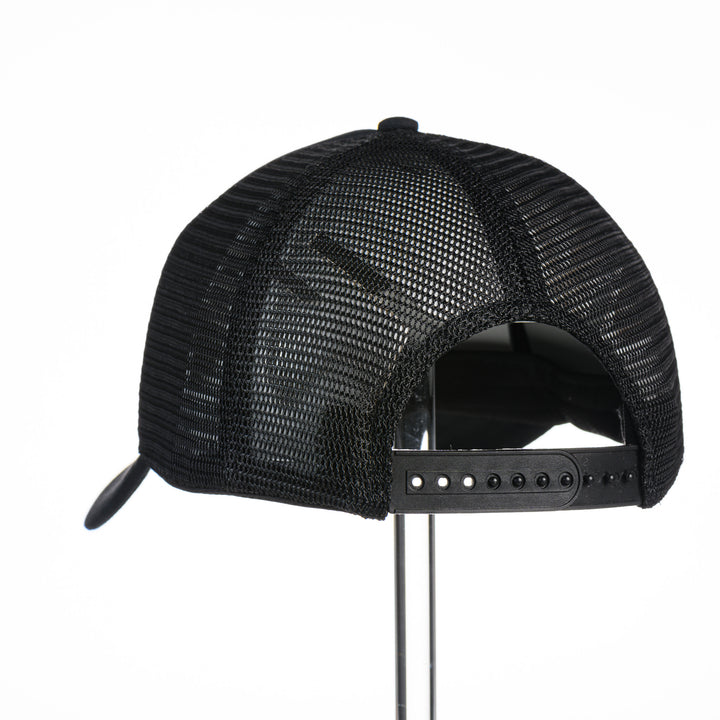 Griz Black Vinyl - Foam Trucker Hat made in Missoula, MT (home of the UM Grizzlies) by Blue Peak Creative—a black-on-black foam trucker hat decorated with vinyl University of Montana Griz script, back