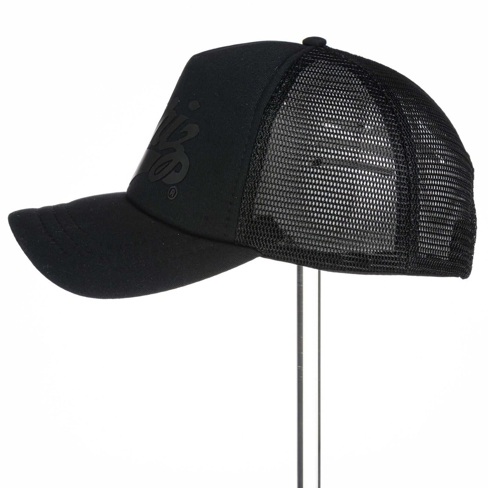 Griz Black Vinyl - Foam Trucker Hat made in Missoula, MT (home of the UM Grizzlies) by Blue Peak Creative—a black-on-black foam trucker hat decorated with vinyl University of Montana Griz script, side