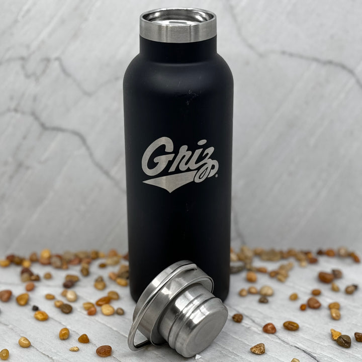 Black Griz Script Black 20oz Stainless Steel Tumbler made in Missoula, MT (home of the UM Grizzlies) by Blue Peak Creative—a black 20 oz. Stainless steel tumbler water bottle printed with a silver University of Montana Griz script (top off)
