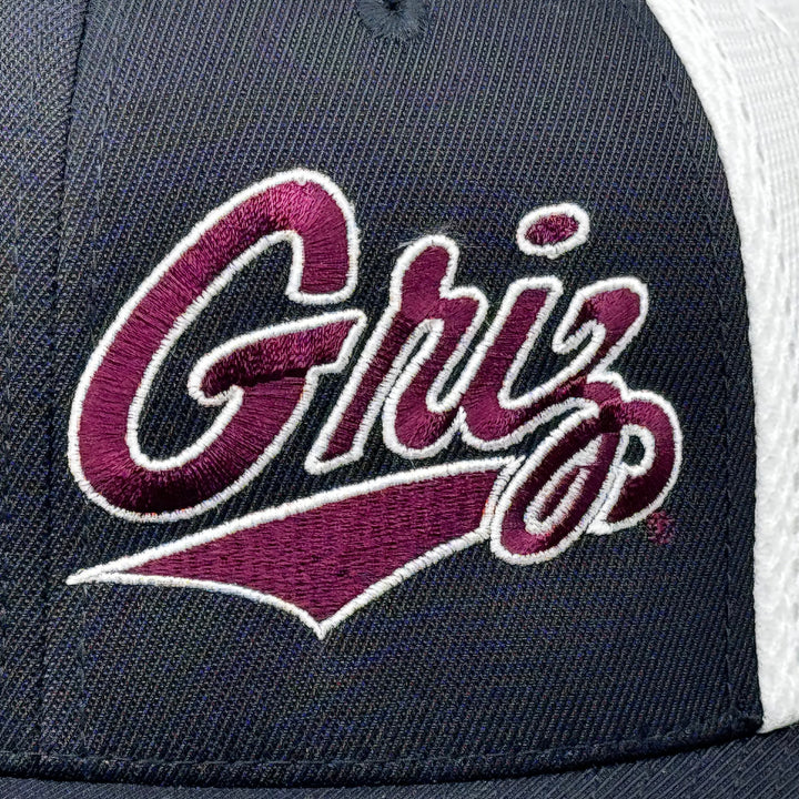 Black and white Outlined Griz Script - Ultrafibre and Airmesh Flexfit Hat made in Missoula, MT (home of the UM Grizzlies) by Blue Peak Creative—a black and white Ultrafibre and Airmesh Flexfit Hat embroidered with the Outlined Griz Script in maroon and white (detail)