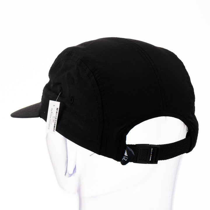 Back of a black 5-panel hat with a brim featuring original black and white artwork by Brittany Finch -  wildflowers stretched across the front panel -  made in Montana by Brittany Finch Art and displayed on a mannequin head 