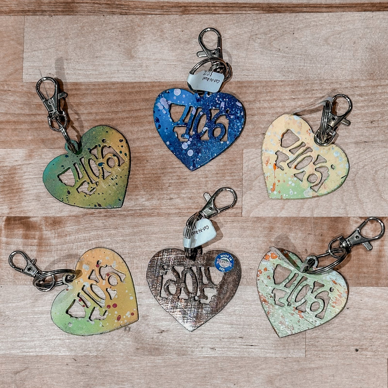 These colorful Montana 406 Metal Keychains are Made in Montana.