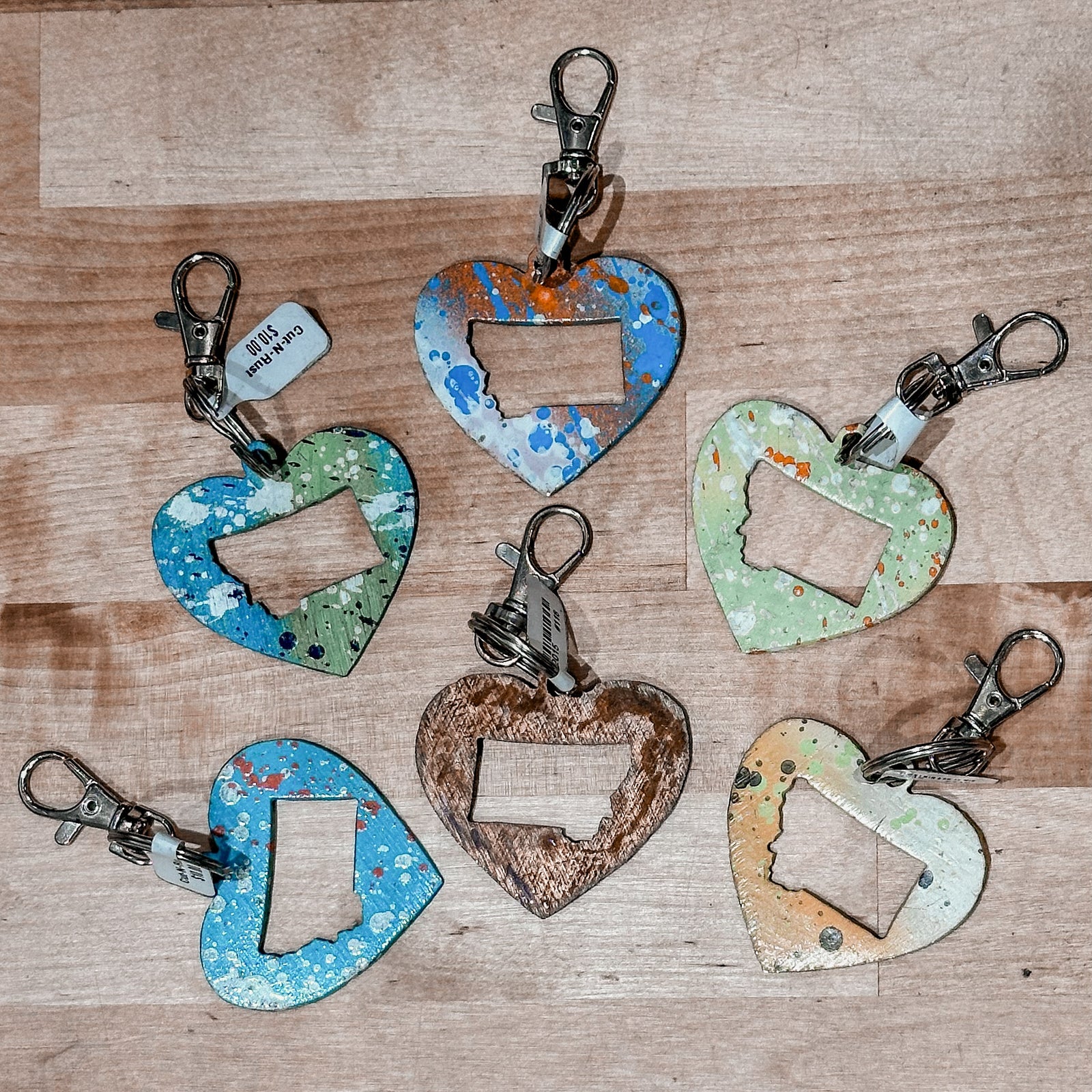 These made in Montana keychains are colorful metal hearts with the state of Montana cut out of them.