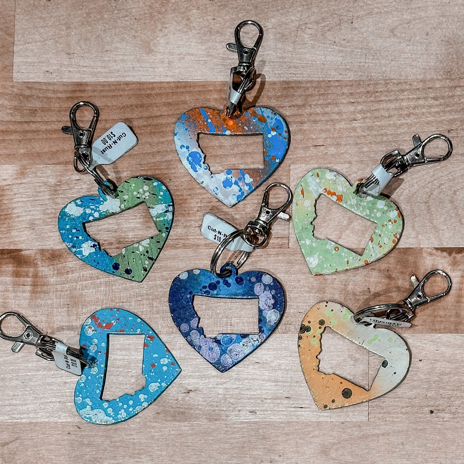 These made in Montana keychains are colorful metal hearts with the state of Montana cut out of them.