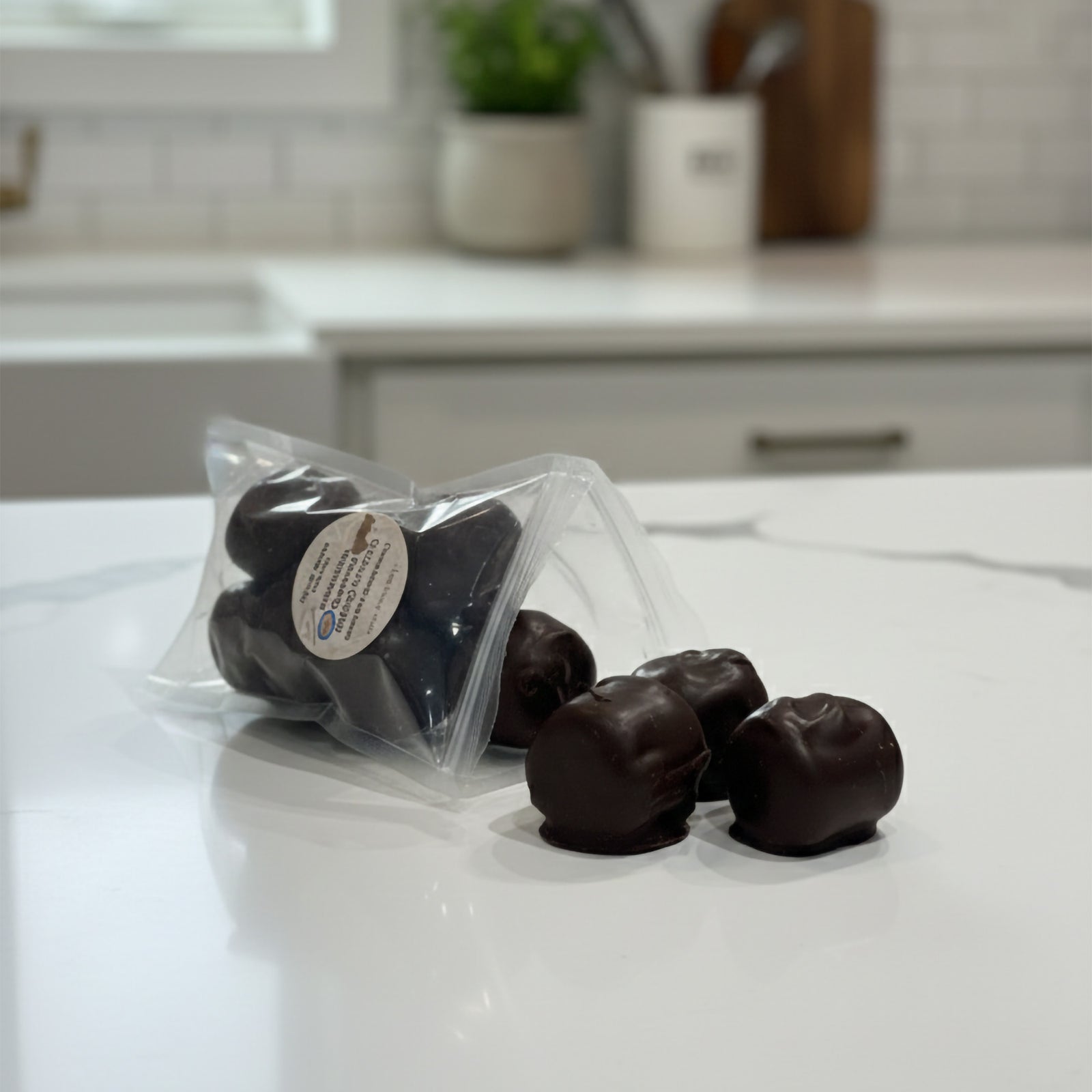 Packaged Montana made dark chocolate covered marshmallows on a kitchen counter