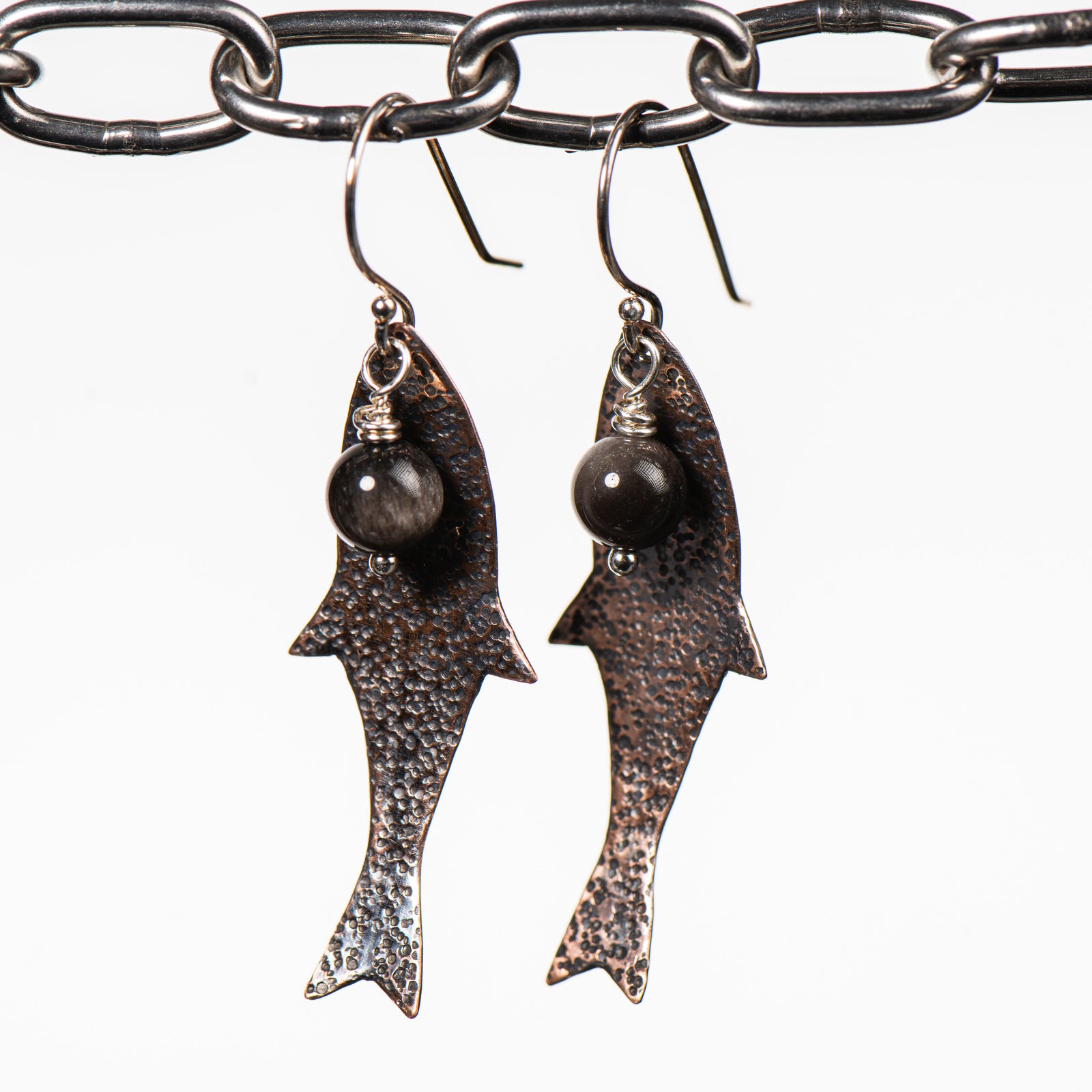 Cobblestone Design of Montana's Fish Earrings with Stone Earrings--fine metal (sterling silver and copper) fish and obsidian beads, handcrafted in Montana