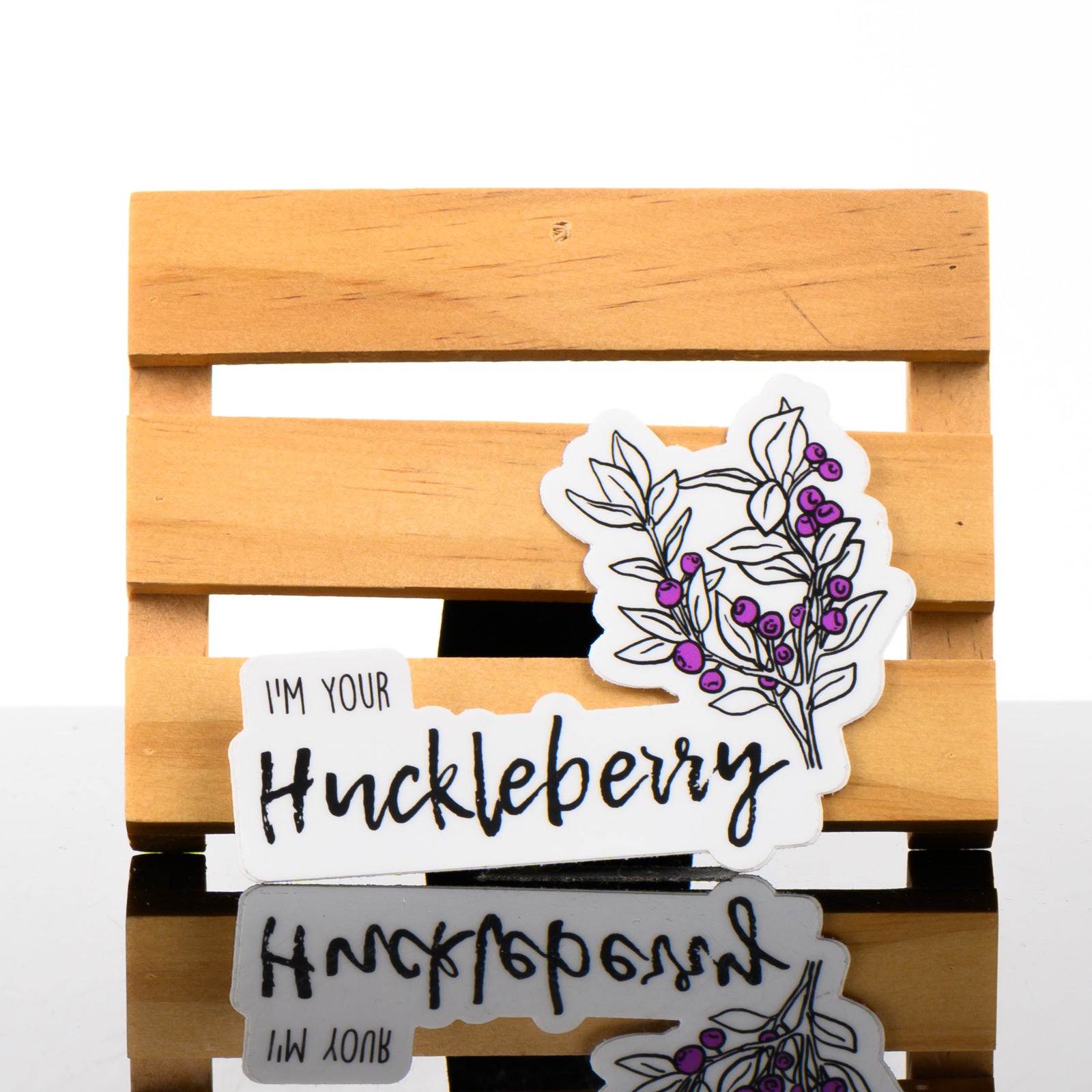 This cute sticker says I'm your huckleberry and has a charming drawing of a huckleberry branch.