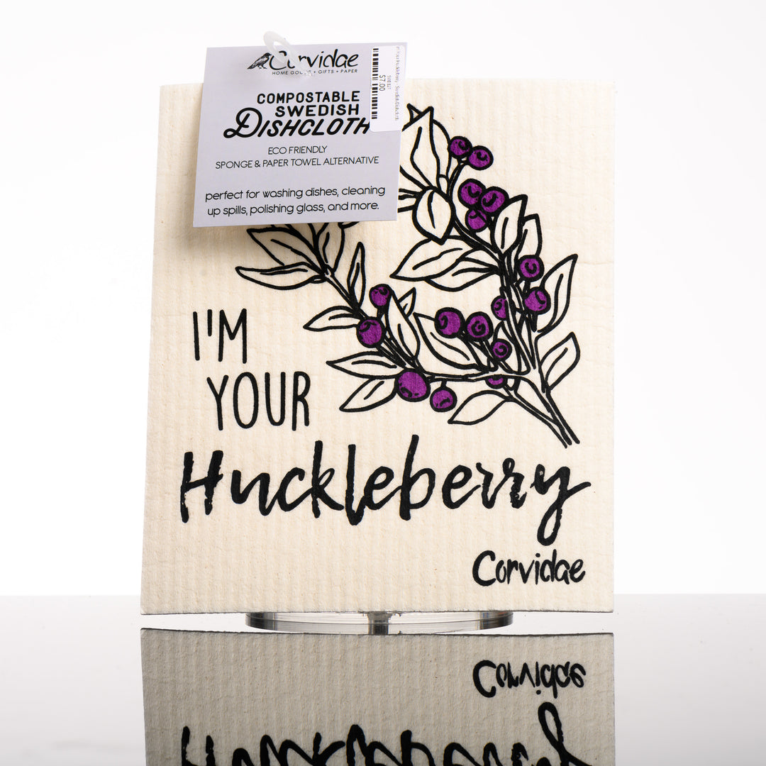Rectangular Swedish Dishcloth depicting huckleberry branches with berries and text, “I’m your huckleberry” - eco friendly sponge and paper towel alternative made in Montana by Corvidae