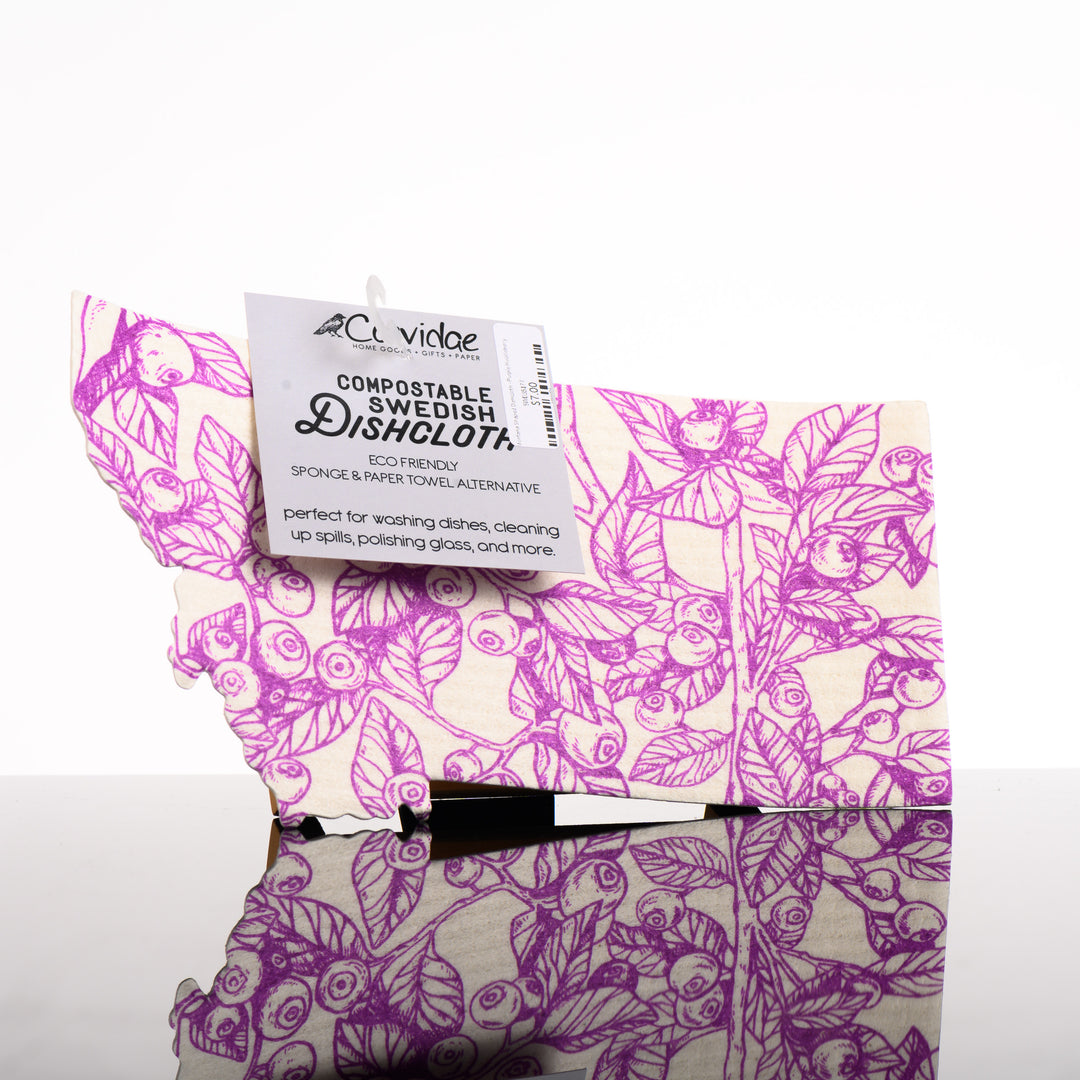 Montana Shaped Swedish Dishcloth depicting a purple huckleberry plants with berries - eco friendly sponge and paper towel alternative made in Montana by Corvidae