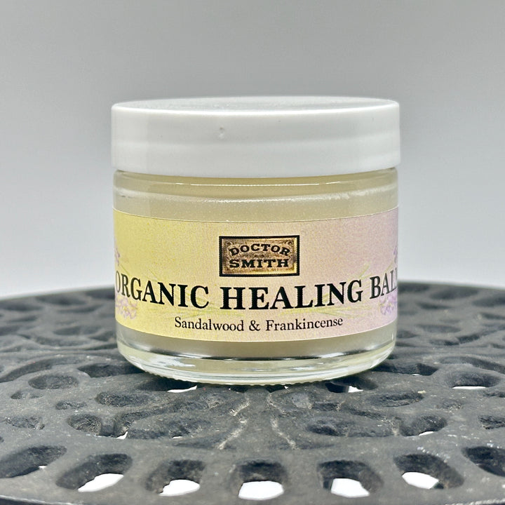 2 oz. jar of Sandalwood & Frankincense Organic Healing Balm, handmade in small batches in Montana by Dr. Smith Botanicals