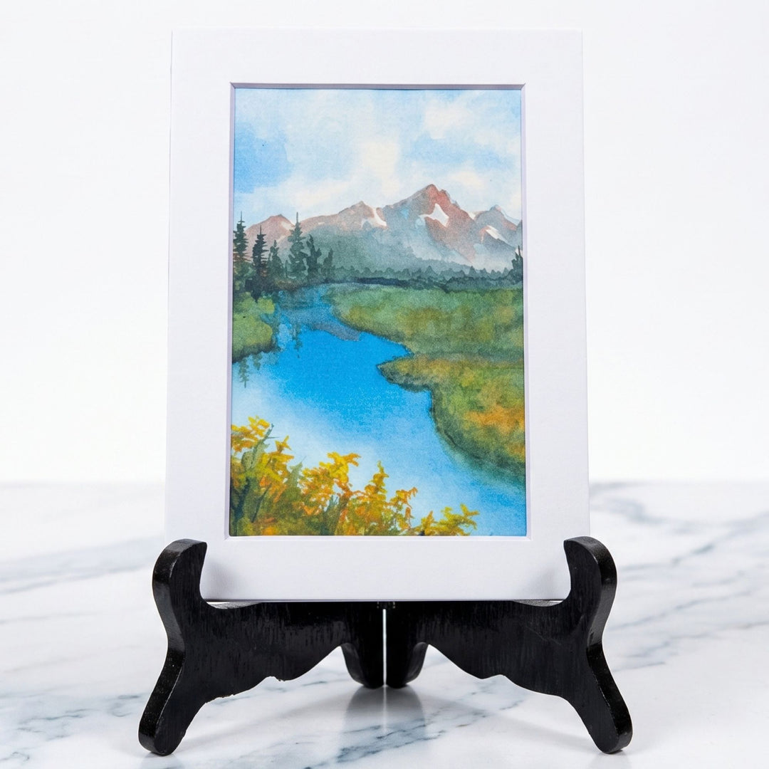 Goldenrod Morning Matted Print: A serene 5x7 Bobbe Almer watercolor reproduction of a Montana mountain landscape with a river and yellow wildflowers. Made in USA.