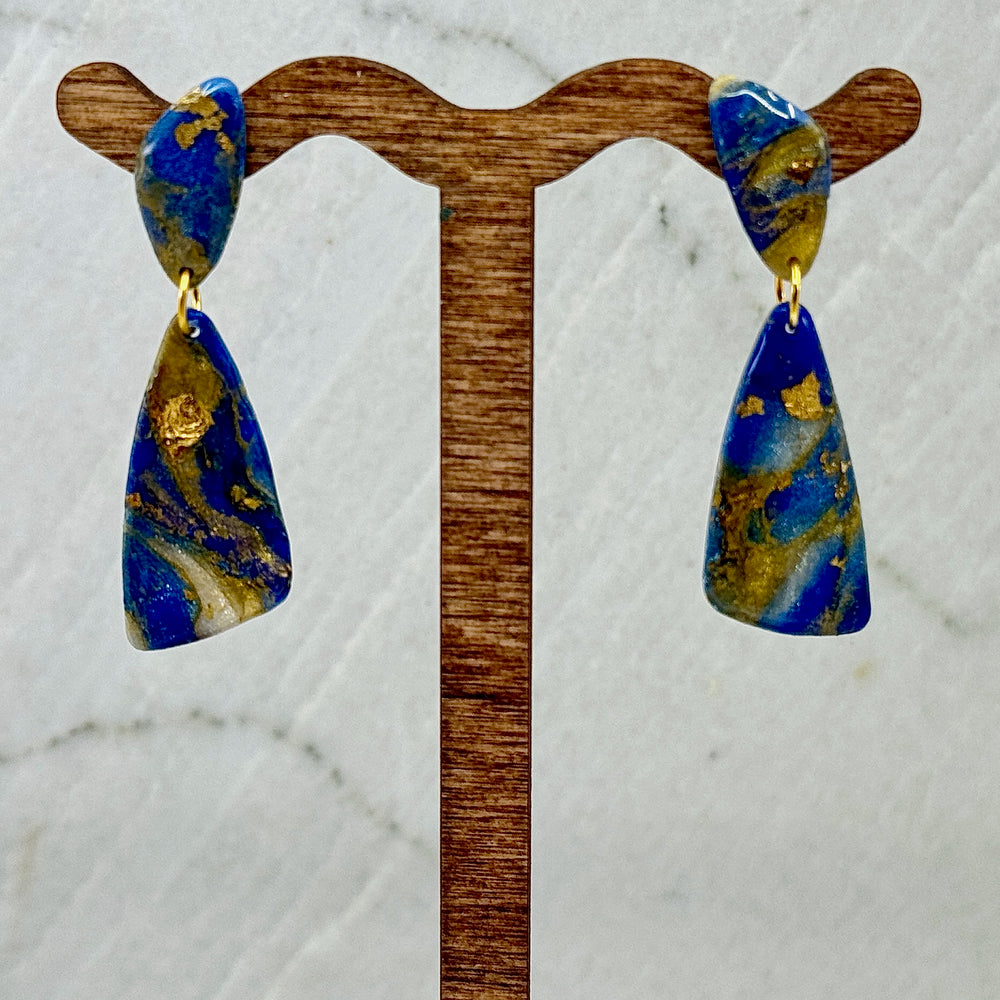 Pair of Abstract Earrings by Bitterroot Shining Creations (blue and gold), hanging