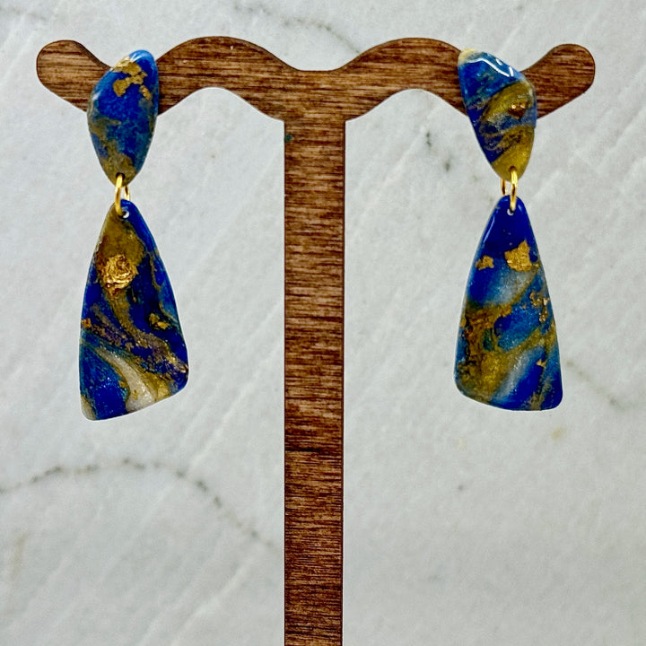 Pair of Abstract Earrings by Bitterroot Shining Creations (blue and gold), hanging