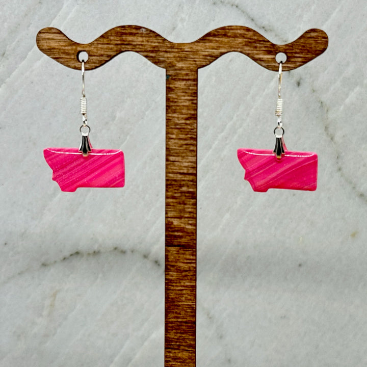 Pair of small, polymer clay Montana Earrings by Bitterroot Shining Creations in assorted sparkly colors (hot pink), hanging