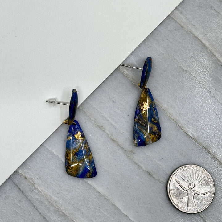 Pair of Abstract Earrings by Bitterroot Shining Creations (blue and gold), with scale