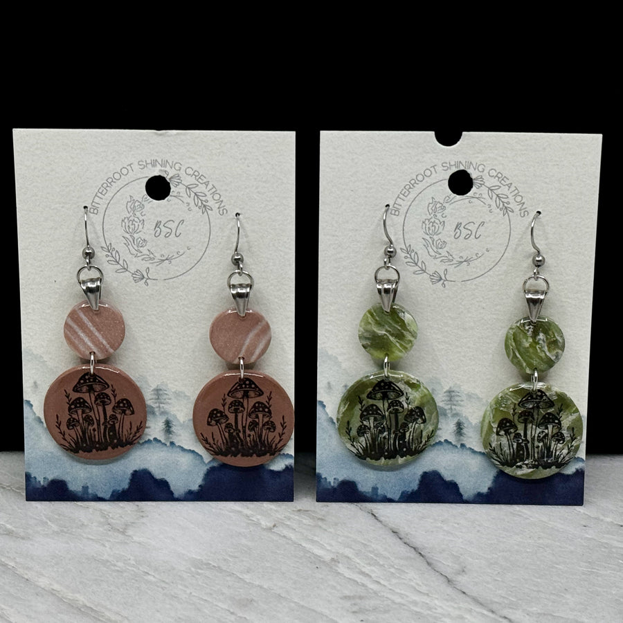 Pair of double drop polymer clay Dangle Mushroom Earrings by Bitterroot Shining Creations (dusty rose or green), on cards