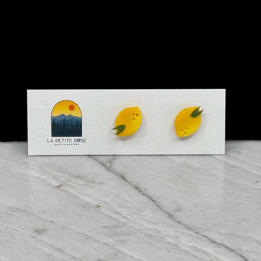 Pair of La Petite Rose's Lemon Clay Stud Earrings, on card