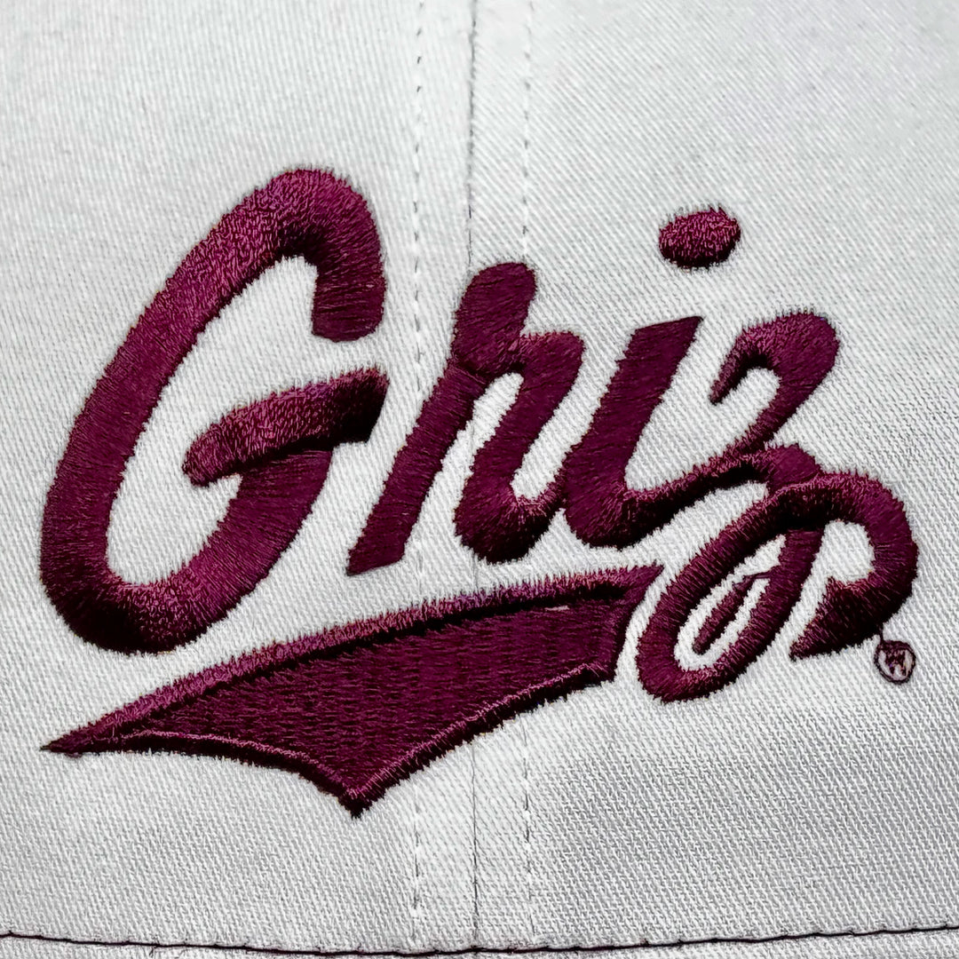Blue Peak Creative's maroon and white Richardson Trucker Hat with the University of MT Griz Script embroidered in maroon (detail)