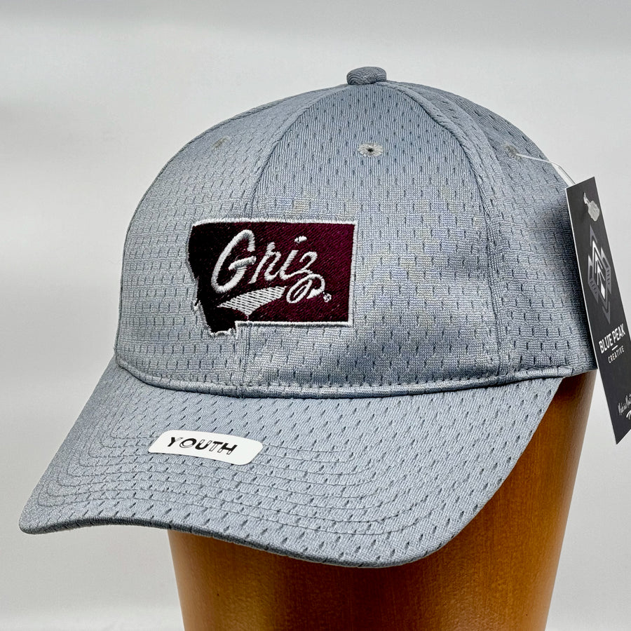Blue Peak Creative's silver Youth Pro Mesh Hat embroidered with the Griz over Montana design in silver and maroon (3/4 view)