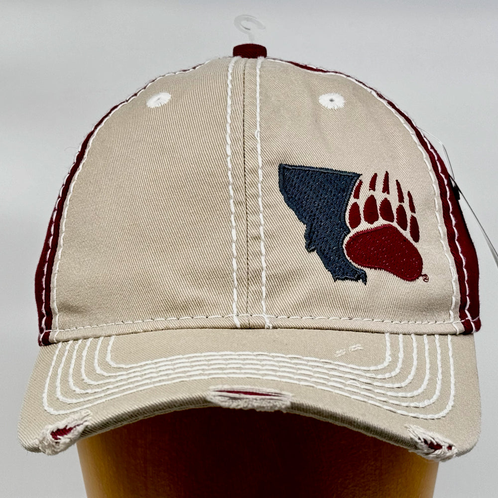 Blue Peak Creative's khaki and maroon Distressed Rambler Hat embroidered with the Montana Paw design in charcoal grey and maroon (front view)