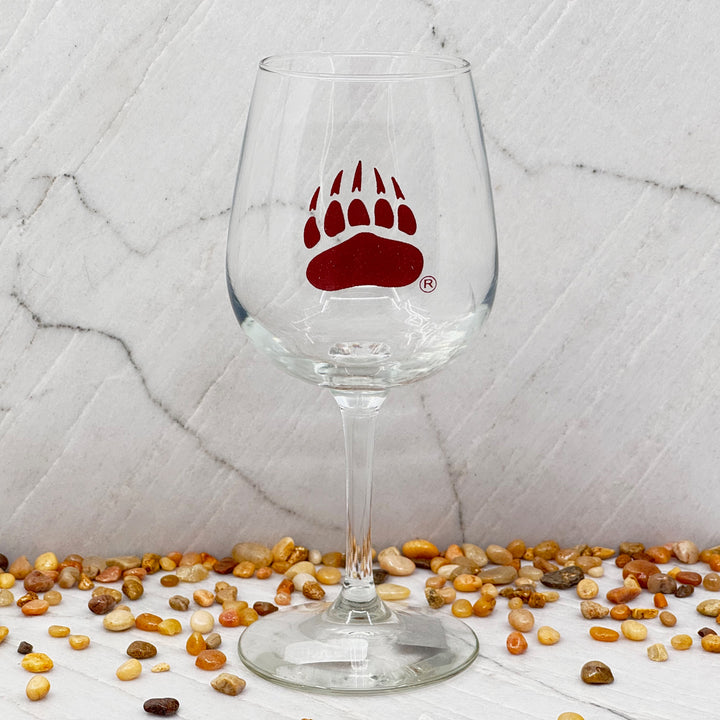 Blue Peak Creative's Griz Paw Wine Glass - a stemmed wine glass featuring the University of MT Grizzlies paw (maroon)