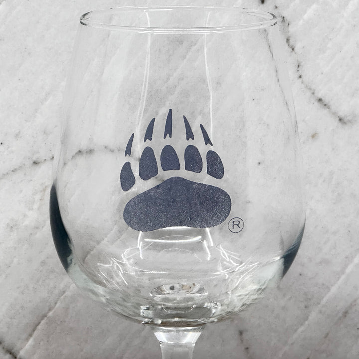 Blue Peak Creative's Griz Paw Wine Glass - a stemmed wine glass featuring the University of MT Grizzlies paw (grey, detail)