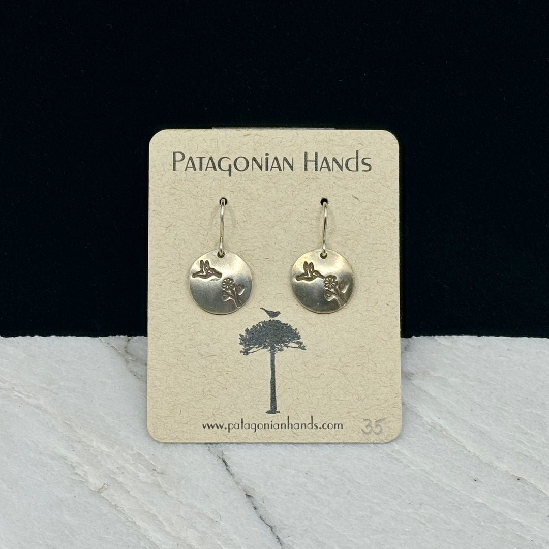 Pair of Patagonian Hands's Fine Silver (.999) Hummingbird Earrings with Sterling Silver (.925) Wires, on card