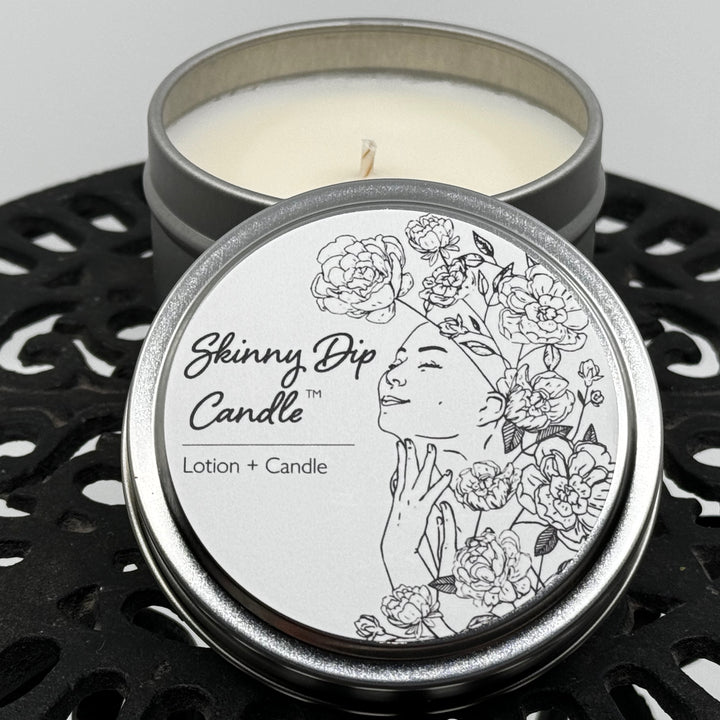 4 oz. tin of Skinny Dip Candle's Irresistible Lotion Candle, lid and inside