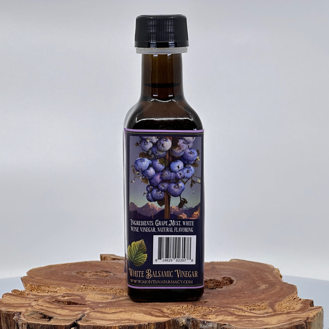 100 ml bottle of Montana Farmacy & Co.'s Iced Huckleberry White Balsamic Vinegar, ingredients