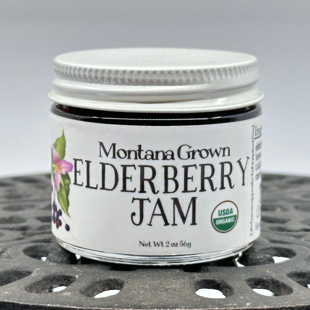 2 oz. jar of Key to the Mountain's Montana Grown Elderberry Jam, front