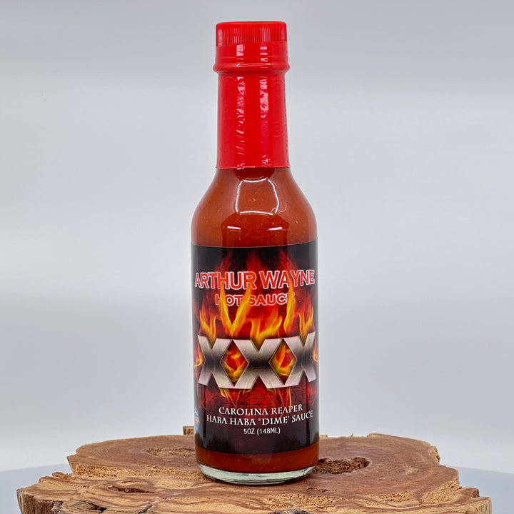 Bottle of Arthur Wayne XXX Carolina Reaper hot sauce, front