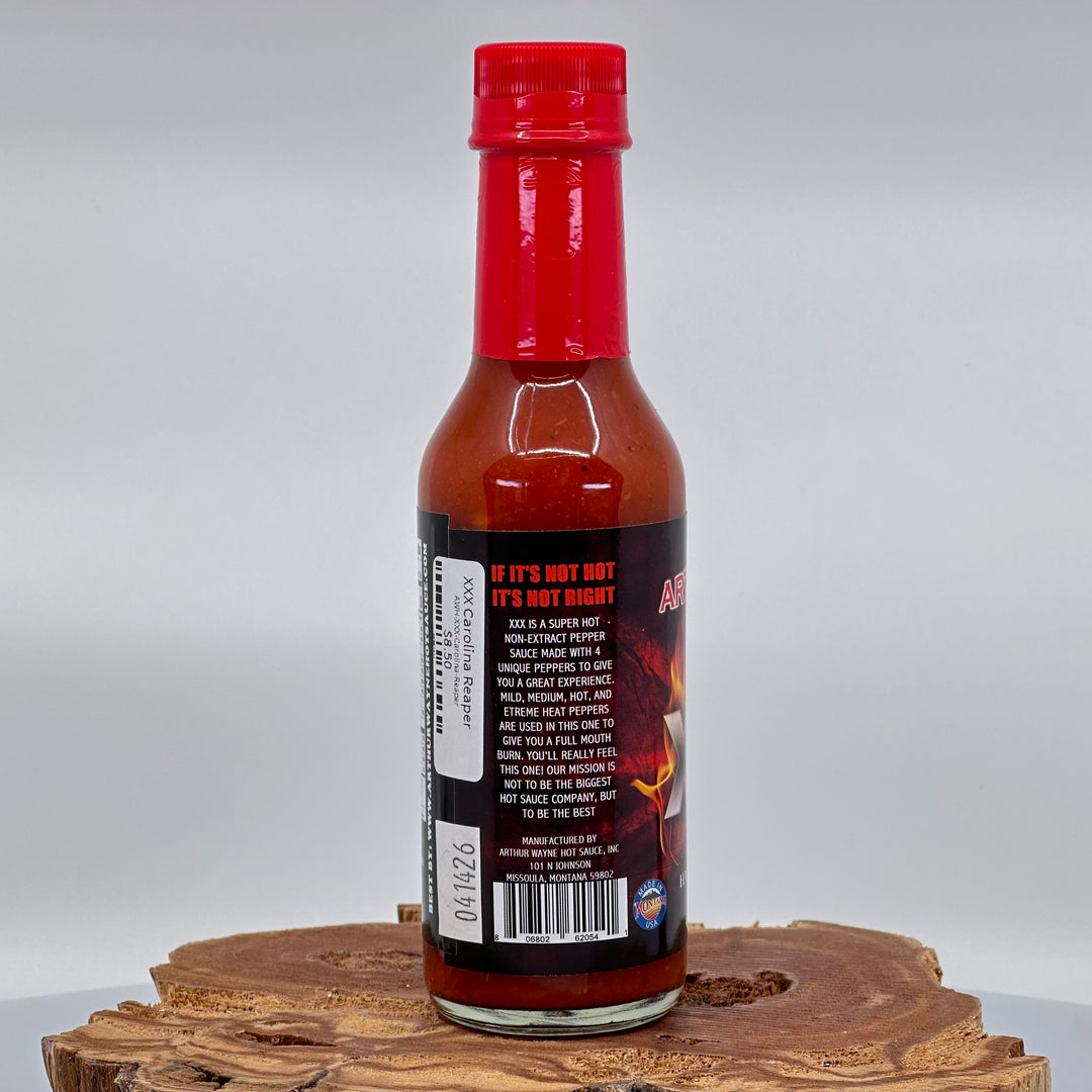 Bottle of Arthur Wayne XXX Carolina Reaper hot sauce, description