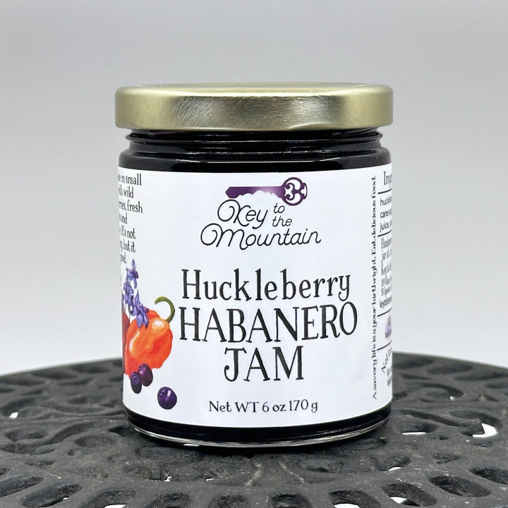 6 oz. jar of Key to the Mountain Huckleberry Habanero Jam, front