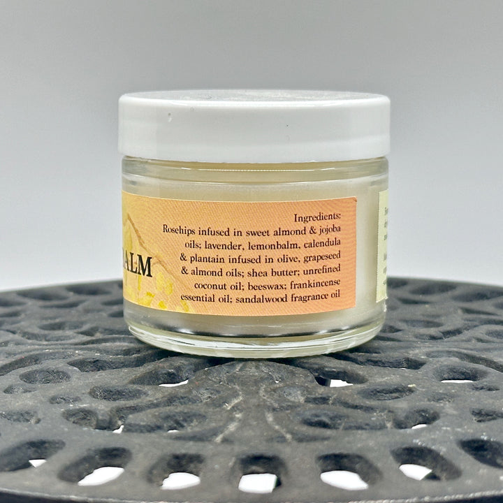 2 oz. jar of Dr. Smith Botanicals' Sandalwood & Frankincense Rosehip Oil Face Balm, ingredients