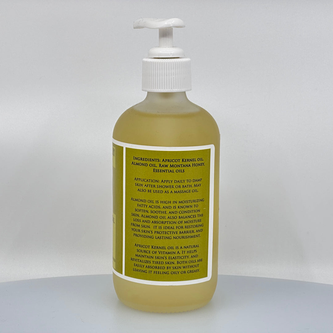 8 oz. bottle of Hindu Hillbilly's Ylang Ylang & Clary Sage Honey Body Oil, ingredients & description