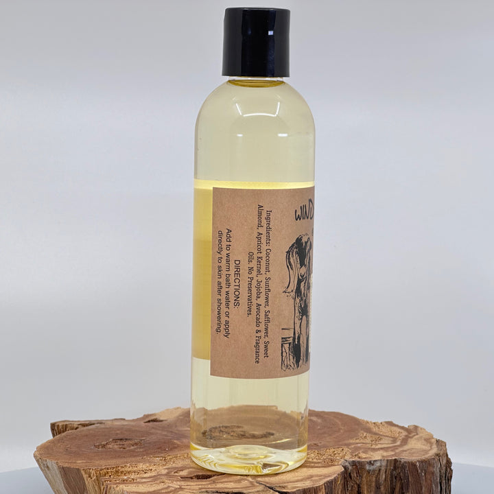 8 oz. bottle of Windrift Hill's Montana Huckleberry Moisturizing Body Oil, ingredients & directions