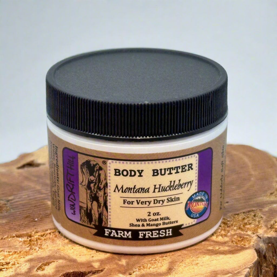 2 oz. jar of Windrift Hill's Montana Huckleberry Goat Milk Body Butter, front