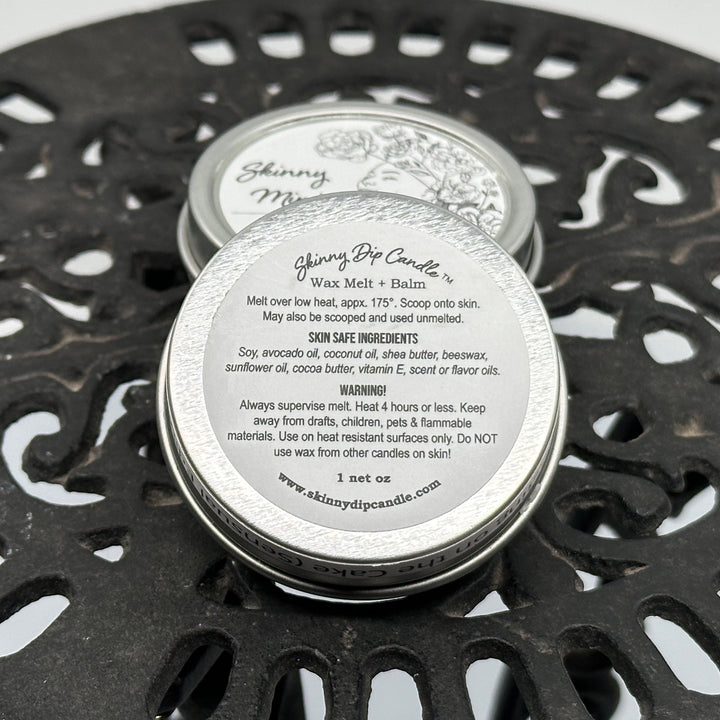 1 oz. tin of Skinny Dip Candle's Frosting on the Cake Lotion + Candle, description & ingredients