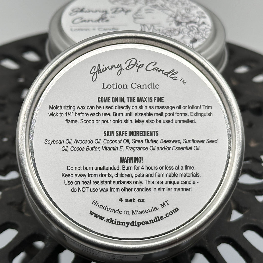 4 oz. tin of Skinny Dip Candle's Between the Sheets (cotton, violet & sandalwood) Lotion + Candle, description & ingredients
