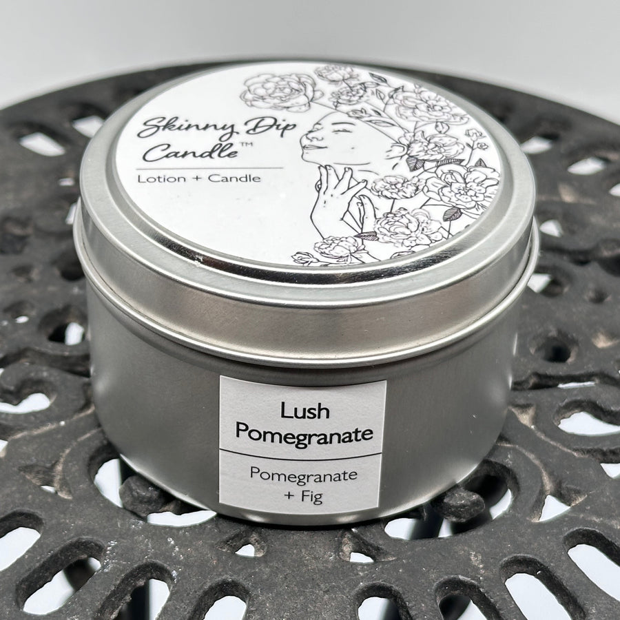 4 oz. tin of Skinny Dip Candle's Lush Pomegranate & Fig Lotion + Candle, front