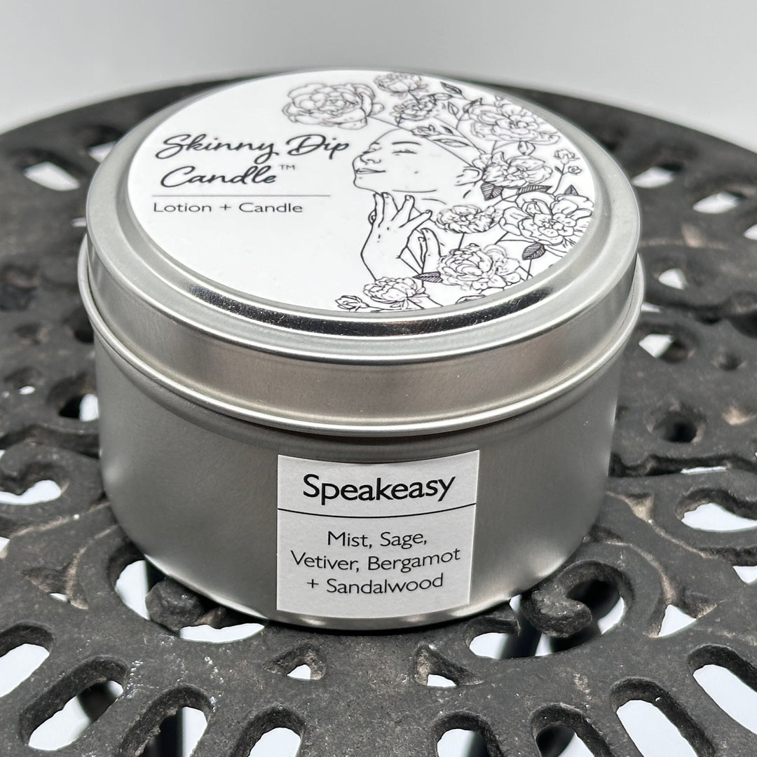 4 oz. tin of Skinny Dip Candle's Speakeasy (mist, sage, vetiver, bergamot & sandalwood) Lotion + Candle, front