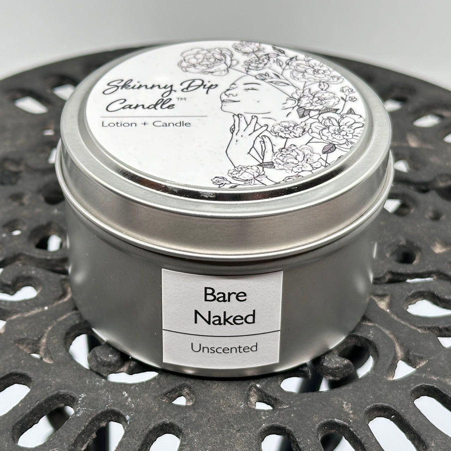4 oz. tin of Skinny Dip Candle's Bare Naked (unscented) Lotion + Candle, front