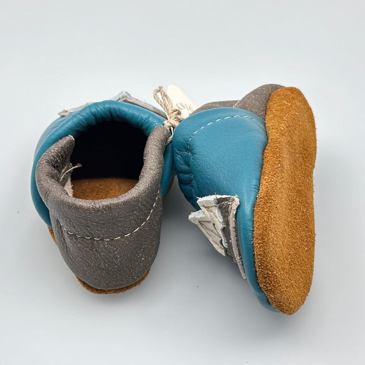 Pair of Starry Knight Design leather moccasins / baby booties, azure & cerulean with mountain design, heel