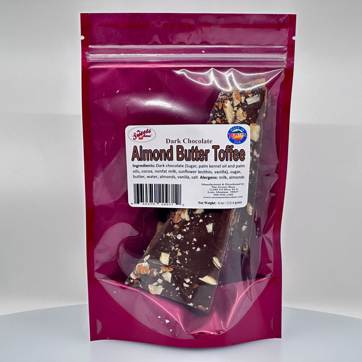 4 oz. bag of Lolo Sweets Barn Dark Chocolate Almond Butter Toffee, front