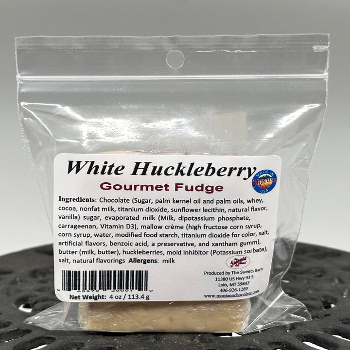 4 oz. package of Lolo Sweets Barn Gourmet White Chocolate Huckleberry Fudge, front